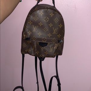 Mono-gram mini back bag